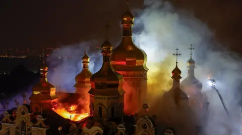 Russian raids kill nine, historic Kyiv cathedral damaged in Ukraine