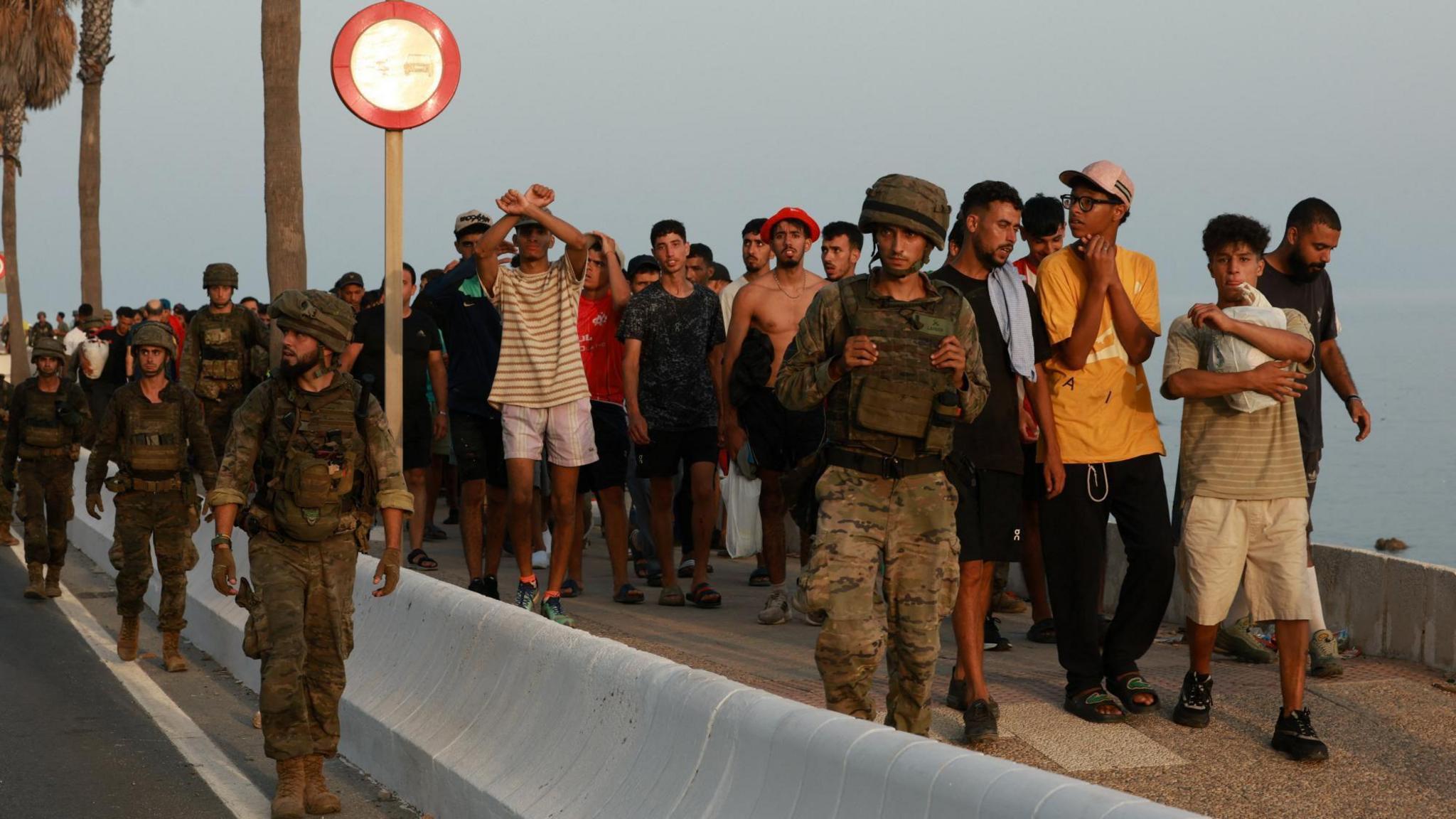 Mass Migration Surge into Ceuta Triggers Political Scandal and Security Measures in Spain