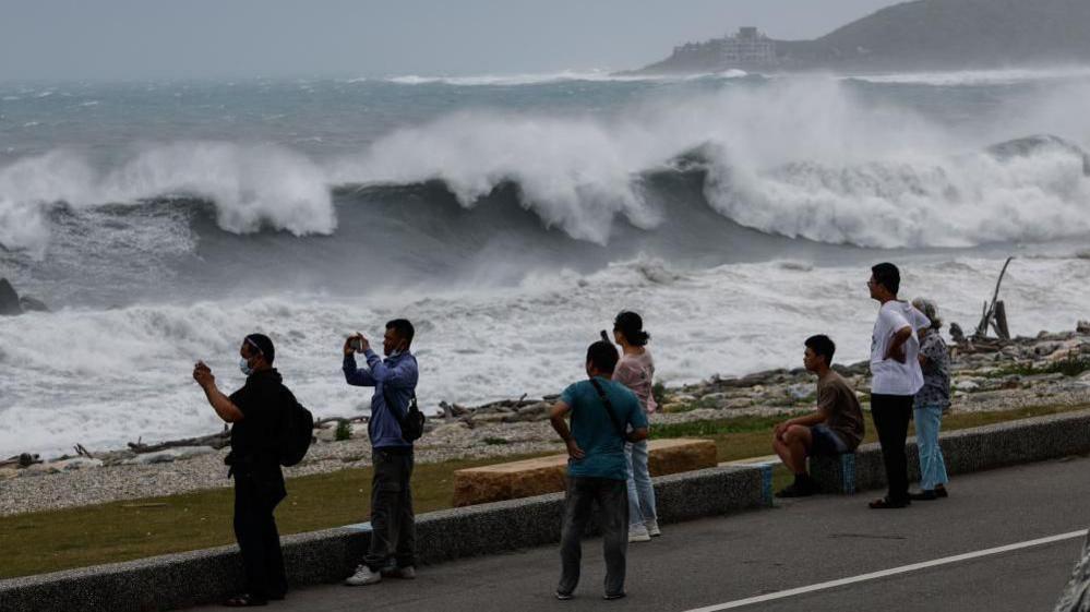 East Asia braces for destructive Typhoon Bavi as landslides kill 15 in Philippines