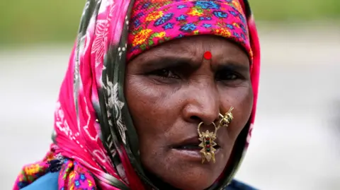 Migrants from Nepal Flee Back Home Amid Unrest in India