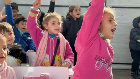 Gaza Children Step Back into Classrooms Amidst War's Aftermath