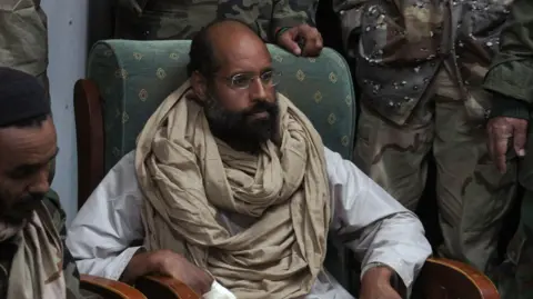 Saif al-Islam Gaddafi, Son of Libyan Dictator, Reportedly Assassinated