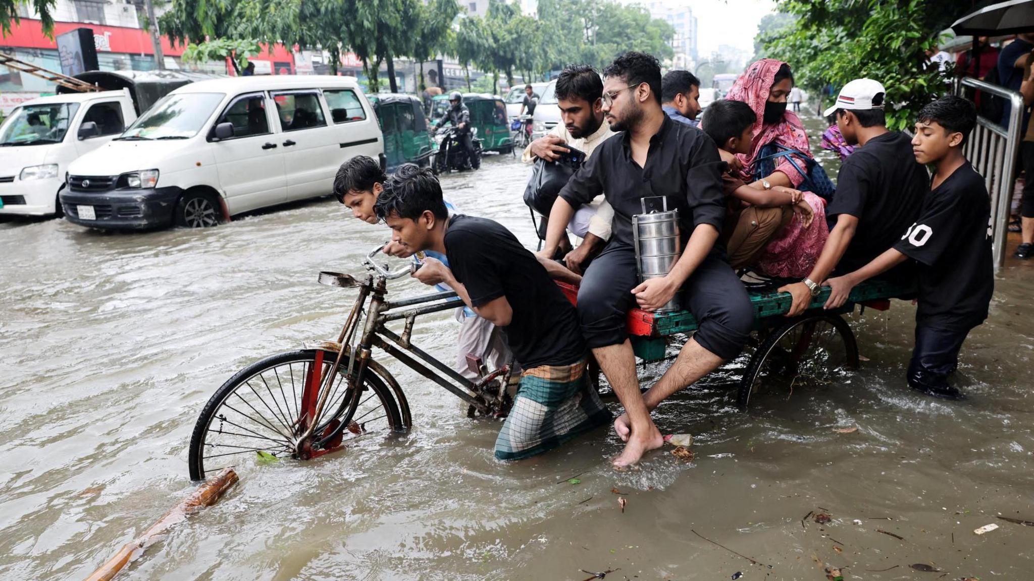 Heavy rains and flash floods in Bangladesh kill 51, displace over a million